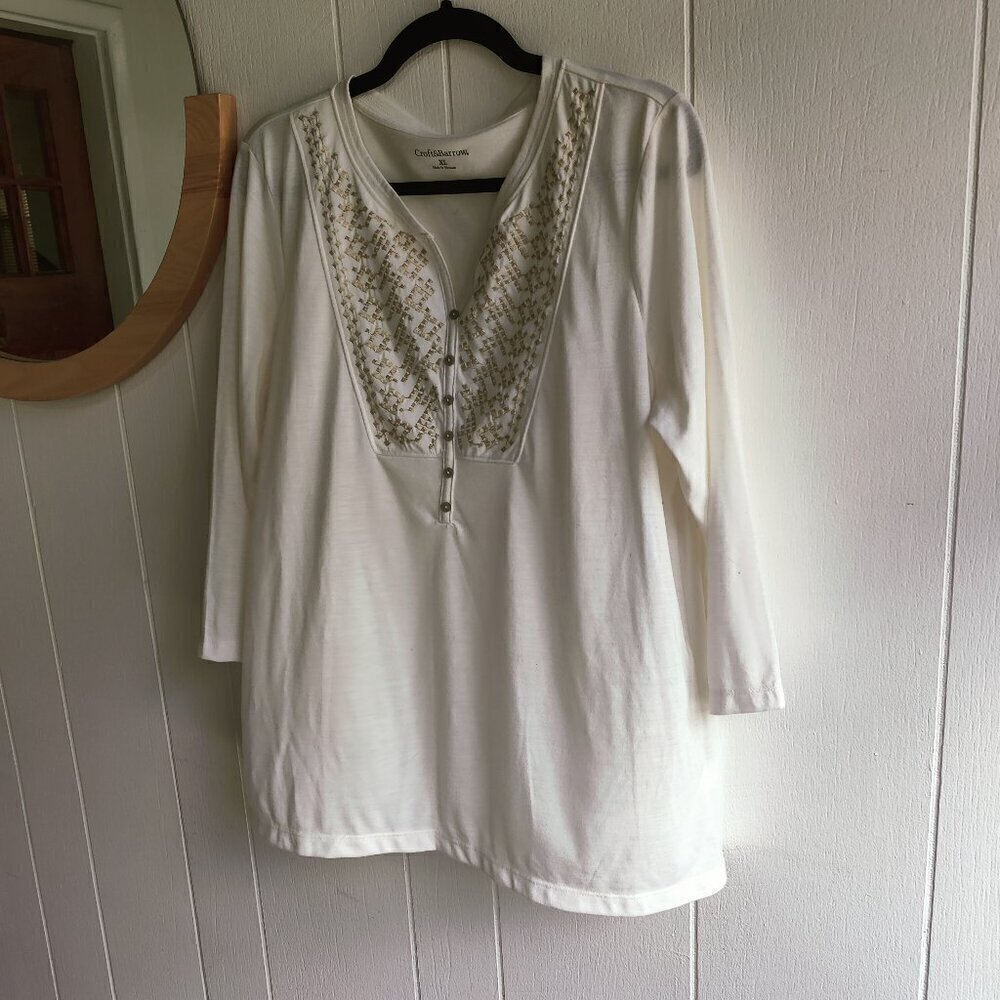 Henley Off White v-neck tee with an abundant embroidery on front in gold. Sz XL